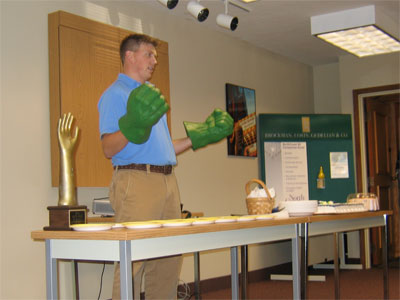 Josh accepting the Gotta Hand it To Ya Award at Brockman, Coats, Gedelian & Co.